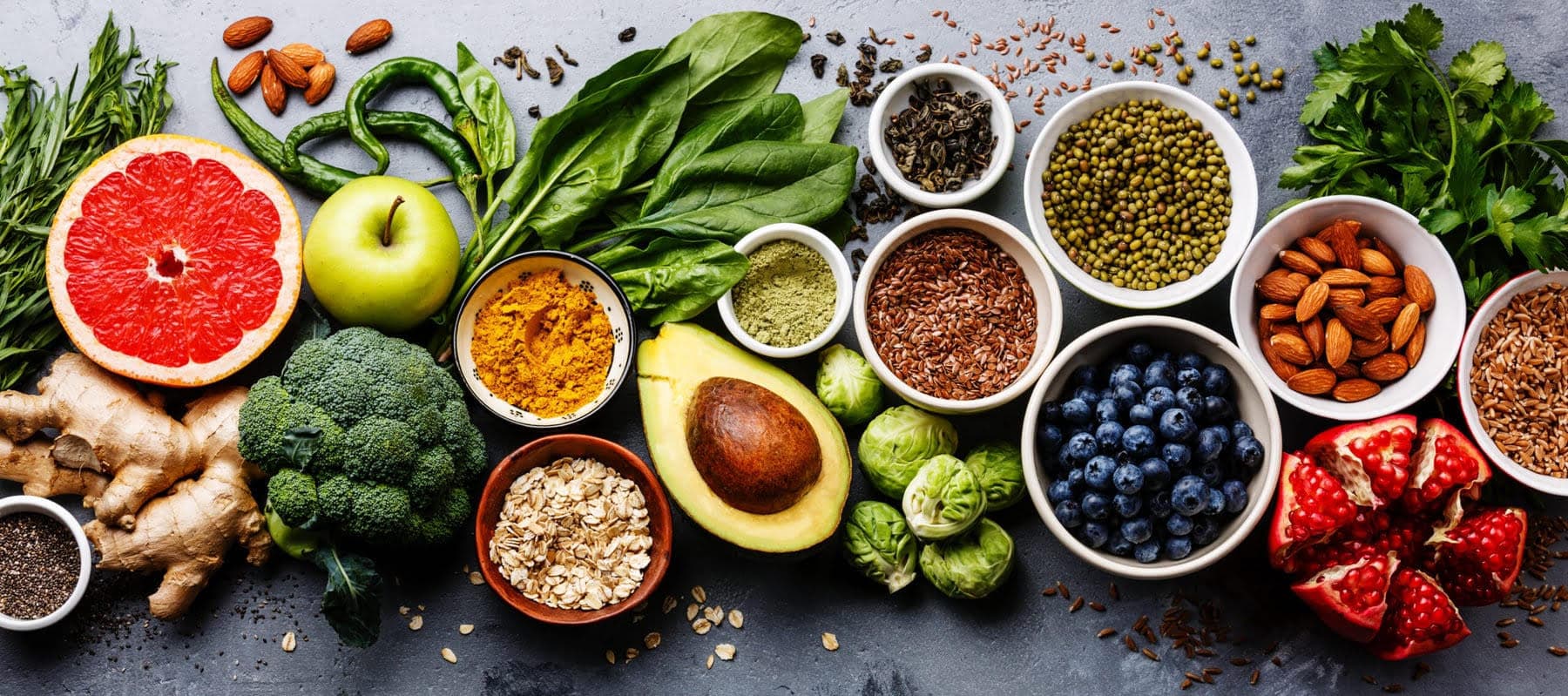 Nutrition and ADHD. An image of healthy foods such as fruit vegetables nuts and seeds
